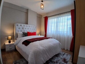 Deluxe Apartment, Balcony, City View | 1 bedroom, individually decorated, individually furnished - Lux Suites Wilma Towers Kilimani (Nairobi)