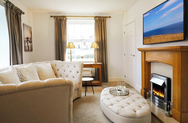 TV, fireplace - Shell Cottage Summary (Filey)