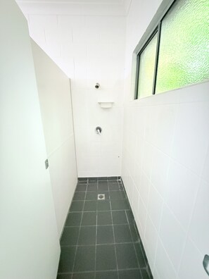 Shower, towels, soap, toilet paper