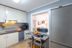 Microwave, coffee/tea maker, cookware/dishes/utensils