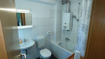 Hair dryer, towels, soap, toilet paper