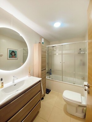 Hair dryer, towels, soap, toilet paper