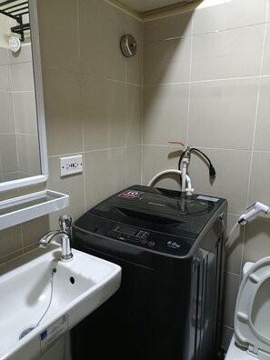 Shower, bidet, towels, soap