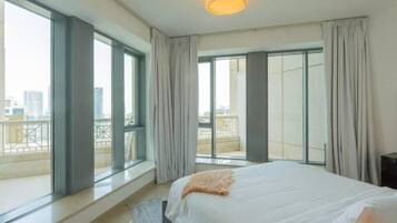 Apartamento, sacada | 1 quarto, ferros/tábuas de passar roupa, Wi-Fi de cortesia