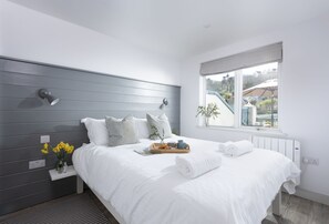 2 slaapkamers, een strijkplank/strijkijzer, wifi, beddengoed