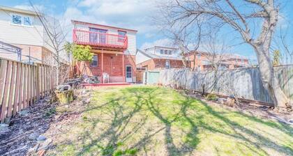 Pet Friendly, Spacious & Bright Main Flr Apt with Yard/Parking/Laundry by Beach