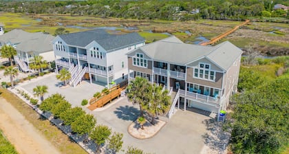 Walk to Beach: Oak Island Retreat w/ 210-yard Dock