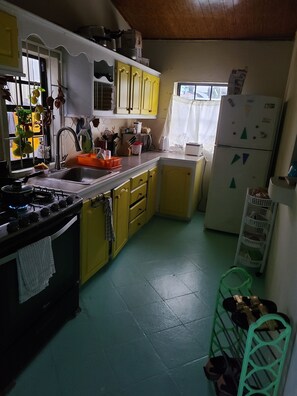 Fridge, microwave, oven, stovetop - Two-bedroom house for rent in the city,  2 minutes from popular Brown's Beach. (Bridgetown)