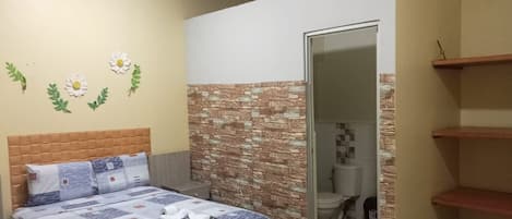 Shower, towels, soap, toilet paper