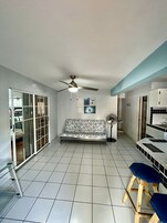 Family Villa, Pool View | Living area | Flat-screen TV