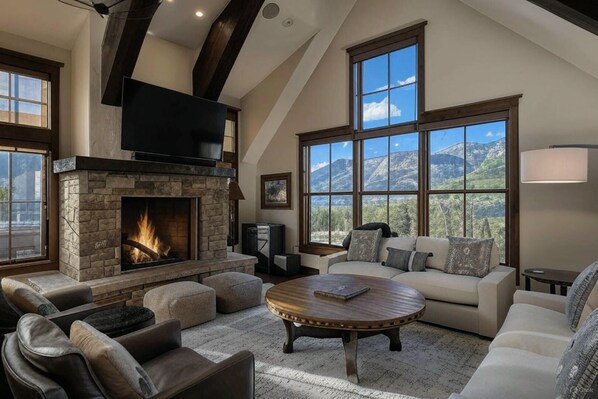 Smart TV, fireplace, books, stereo