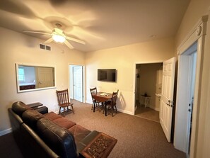 Family Suite #4 | Living area | 43-inch flat-screen TV with cable channels - Lake Huron Lodge (Lexington)