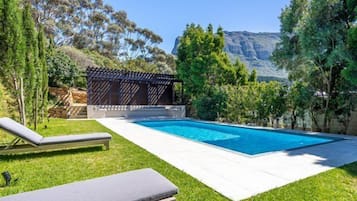 5 outdoor pools, open 7:00 AM to 9:00 PM, pool umbrellas, pool loungers