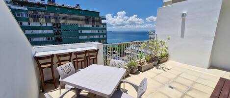 Apartamento | Restaurante al aire libre