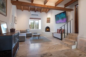 Smart TV, fireplace, books
