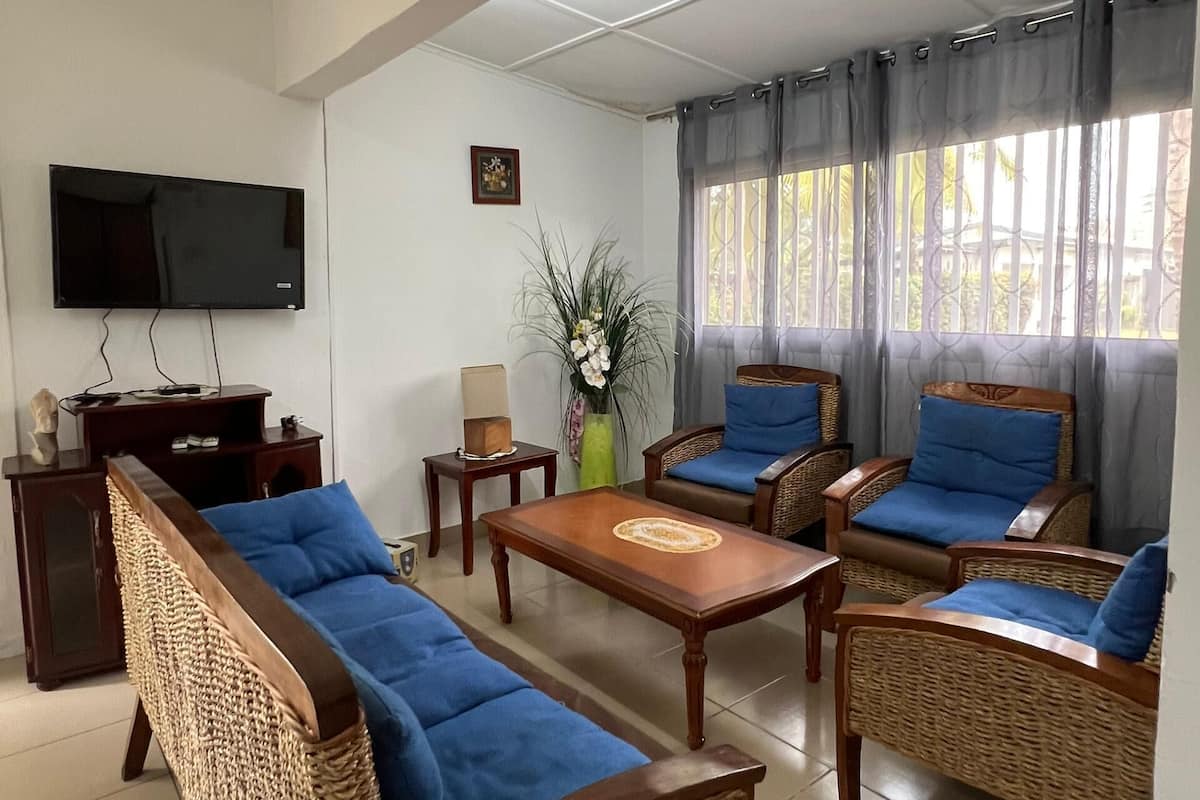 Economy Villa, 3 Bedrooms, Beachside | Living area | 32-inch flat-screen TV with satellite channels