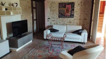 Una Smart TV, una chimenea