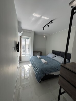 2 quartos, ferros/tábuas de passar roupa, Wi-Fi, roupa de cama