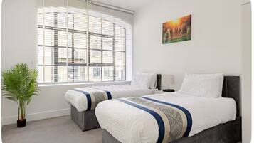 2 bedrooms, desk, iron/ironing board, travel cot