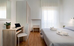 1 bedroom, desk, iron/ironing board, travel crib