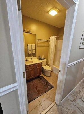 Hair dryer, towels, soap, shampoo