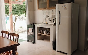 Family Apartment | Private kitchen | Mini-fridge, microwave, oven, cookware/dishes/utensils