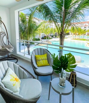 Family Apartment, 2 Bedrooms, Balcony, Pool View | Balcony - Dimary Charming Apt, 5 Pools, Walk to the Beach Dominicus Bayahibe la Romana (Dominicus)