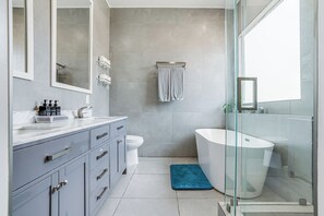Hair dryer, towels, soap, shampoo