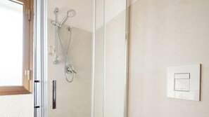 Shower, free toiletries, hair dryer, bathrobes