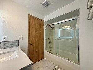 Hair dryer, towels, soap, shampoo