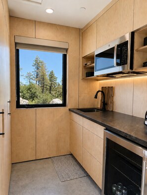 Microwave, coffee/tea maker, toaster, cookware/dishes/utensils