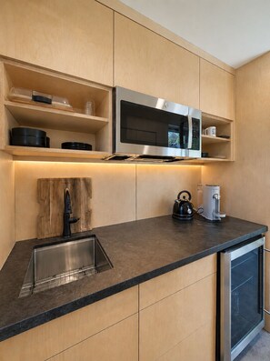 Microwave, coffee/tea maker, toaster, cookware/dishes/utensils