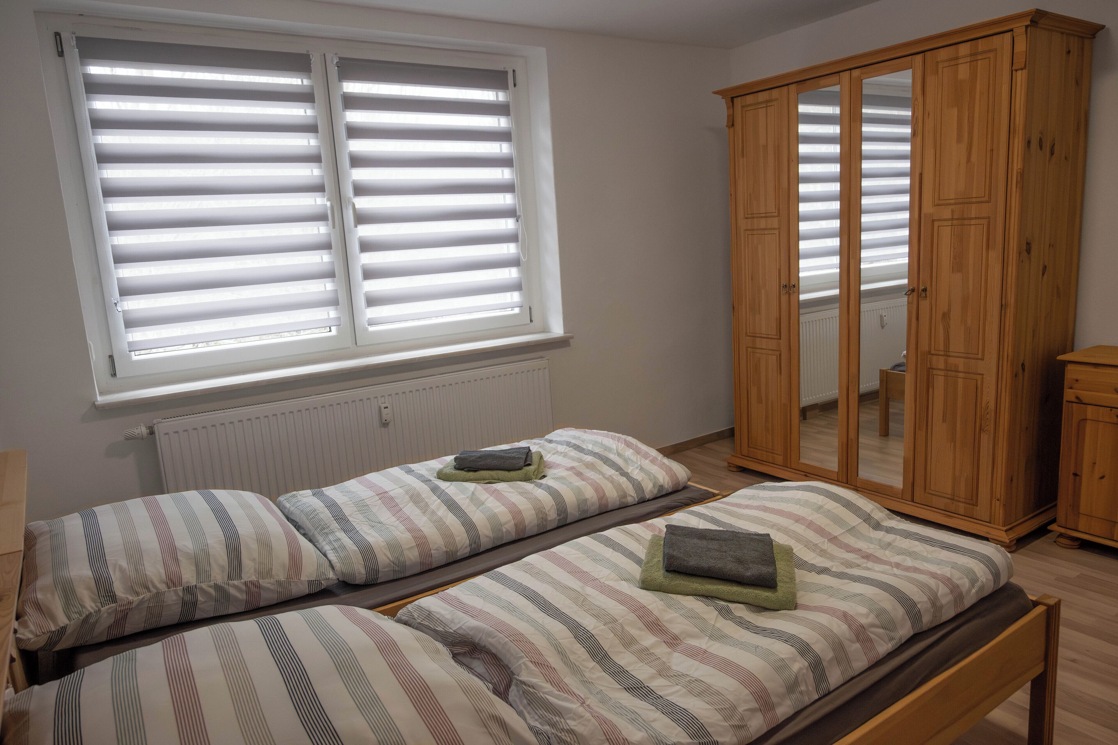 2 quartos, berço de viagem, Wi-Fi de cortesia, roupa de cama