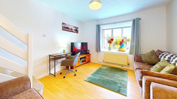 Ferienhaus | Wohnbereich | Fernseher