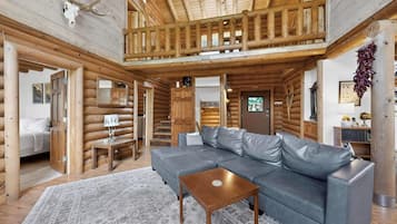 Älytelevisio, takka, kirjoja, tulostin