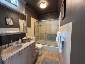 Hair dryer, towels, soap, shampoo