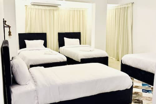 Comfort-Vierbettzimmer, Bergblick | Hochwertige Bettwaren, Daunenbettdecken, Pillowtop-Betten, Minibar