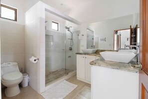 Shower, hair dryer, towels, soap