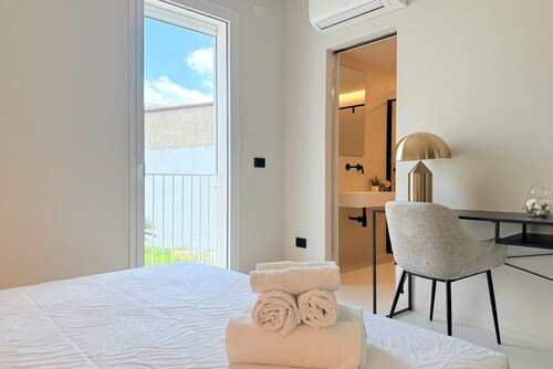 [I Nidi di Dommos] Design rooms in the historic center