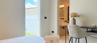 [I Nidi di Dommos] Design rooms in the historic center