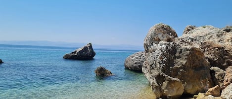 Na praia, toalhas de praia