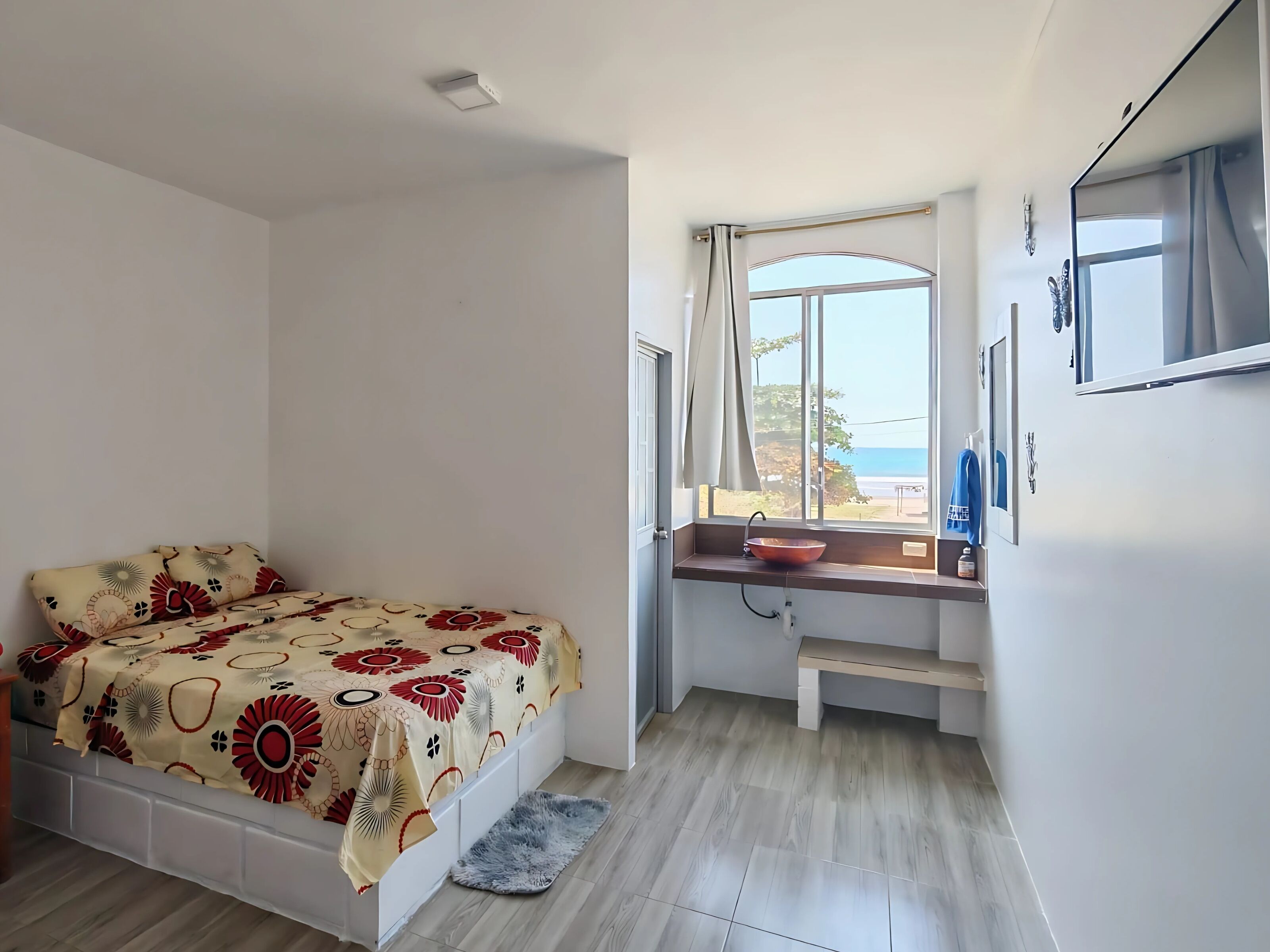 Basic Double Room, 1 Double Bed, Non Smoking, Beach View | Free WiFi, bed sheets