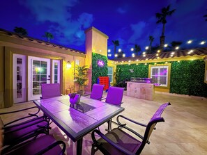 Outdoor dining - Luxury Estate with Pool, Free Spa Heat, Gym, & Game Room! 6mi. to The Strip (Las Vegas)