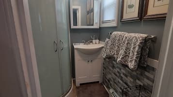 Shower, towels, soap, shampoo