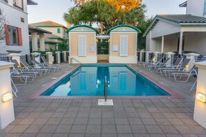A pool area with lounge chairs and a clear pool. - 9 Rue Martine in Miramar Beach (Miramar Beach)