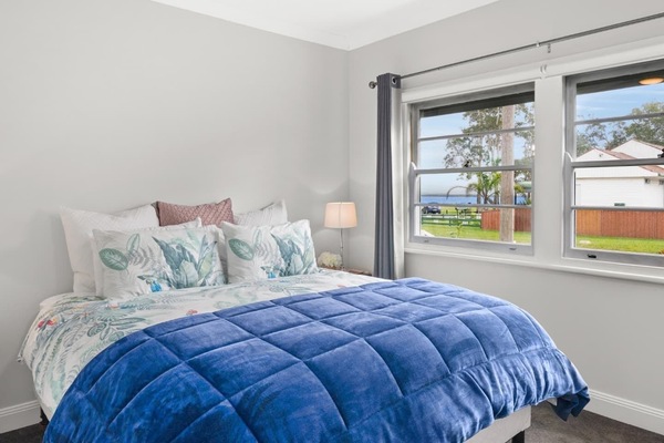 Main bedroom King size bed, 2 bedsides, roller shutters on the outside windows