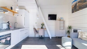A modern interior with a kitchen, dining area, and living space. - Residence Domburg by Interhome (Domburg)