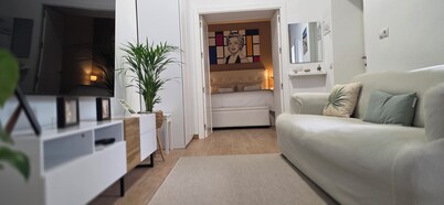 Charming 2-bedroom apartment with WiFi, AC in tranquil Alcalá de los Gazules