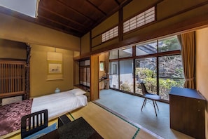 Quadruple Room, Garden View | In-room safe, desk, iron/ironing board, free WiFi