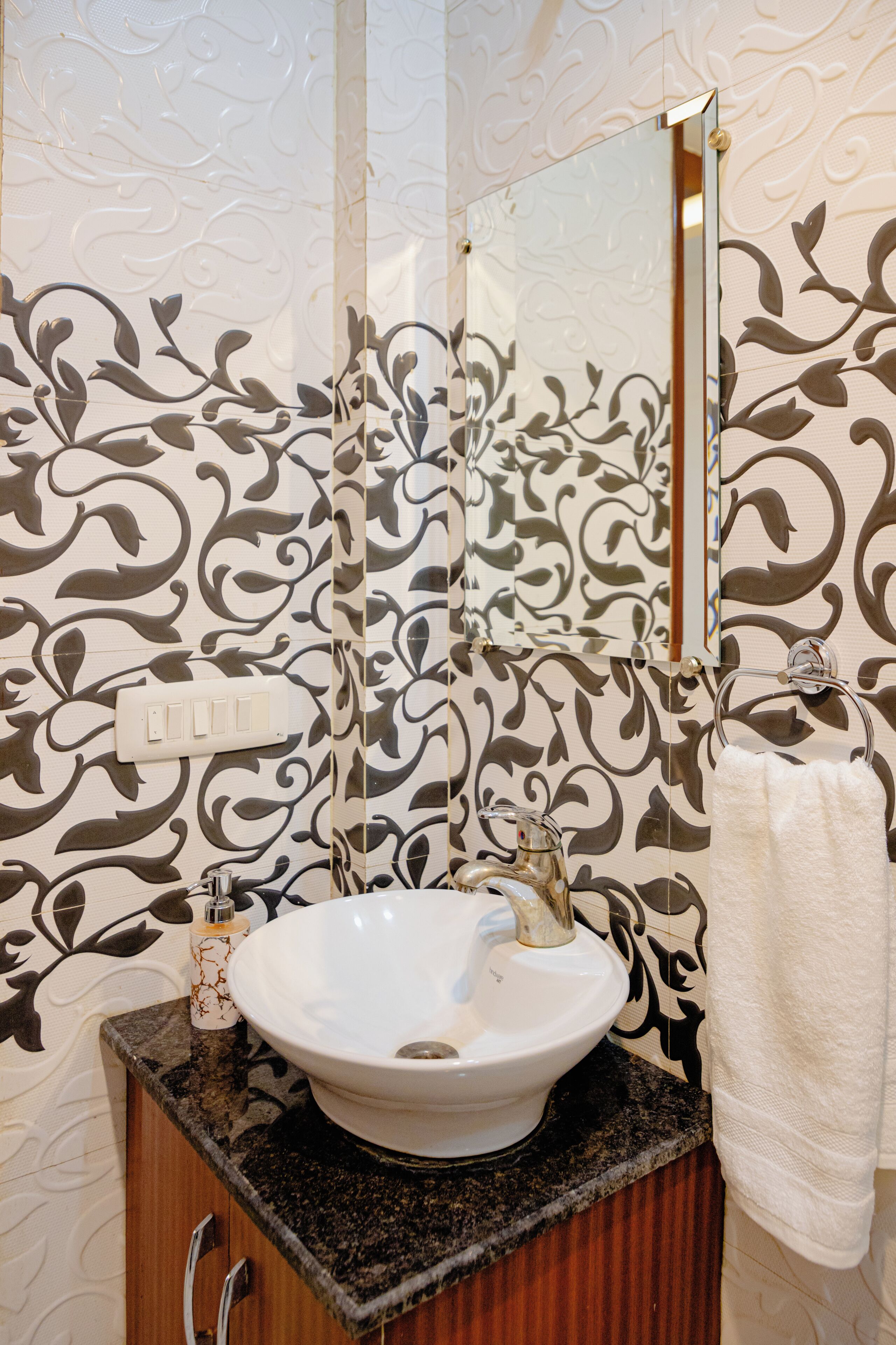 Bidet, towels, soap, toilet paper